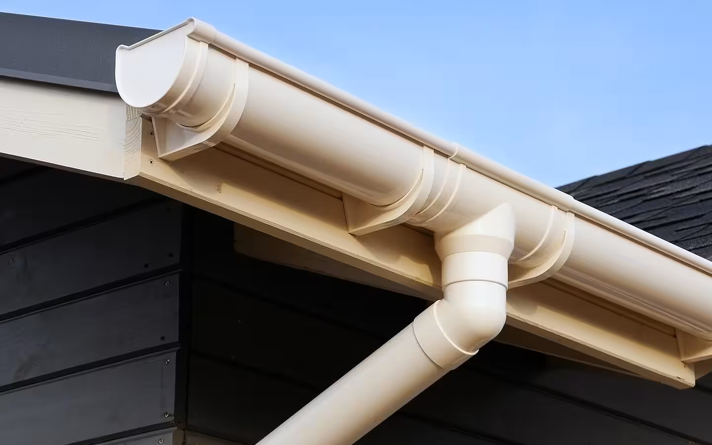 Half-round gutters and downspout